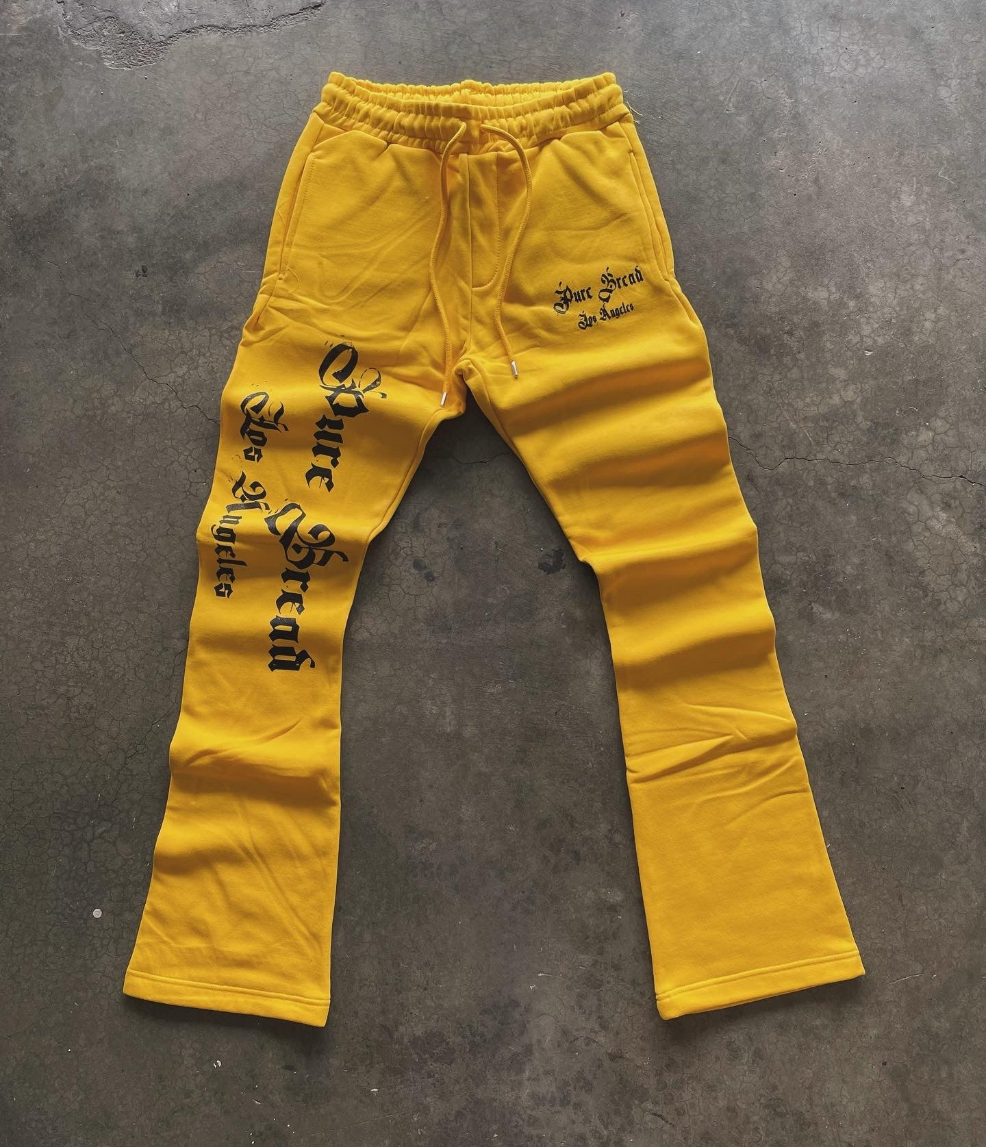 Old English stacked sweats